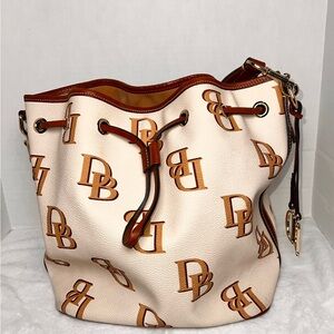 ****SOLD***

Dooney & Bourke monogram collection White and Brown Bucket Bag